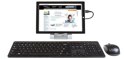Tablet shown connected to the hub as a host, along with a USB keyboard and mouse attached to the hub