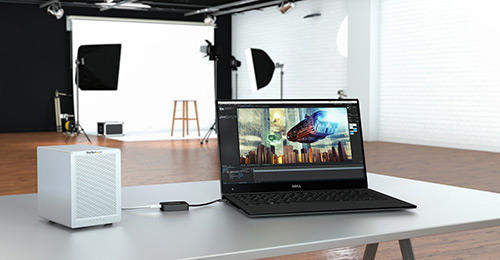 A Thunderbolt 3 laptop connected to a Thunderbolt 2 drive enclosure, using the TBT3TBTADAP adapter