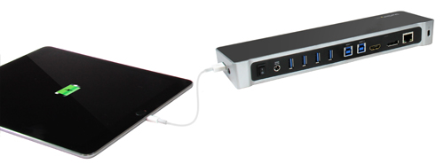 Dual-laptop docking station fast-charging a tablet from the side USB fast-charge port